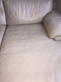 Italian leather taupe sectional sofa. Excellent, clean condition. Down filled. Cushions have zippers. Dimensions: Width: 120". Sofa Depth: 48". Chaise Depth: 64". Height including Back Cushions: 32". Use as one whole sectional or use chaise lounge separately. All parts are finished.