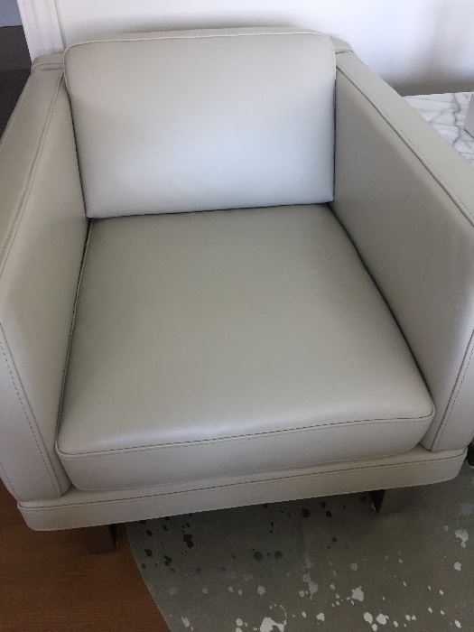 SET OF FOUR lounge/club silver leather arm chairs. Excellent, clean condition. Can buy a pair or all 4. Dimensions: Height: 28". Width: 32". Depth: 41".