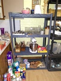 Kitchen Aid mixer, knife sets, blender, glasses, under-the-sink stuff