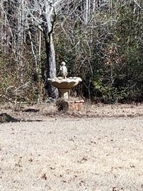 LOTS of concrete yard art