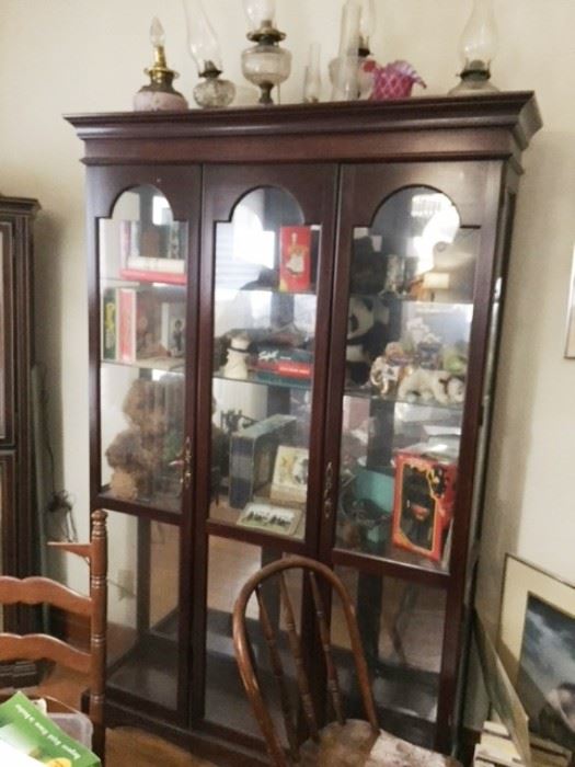 Scalloped widow in this glass and wood display curio, display, catinet