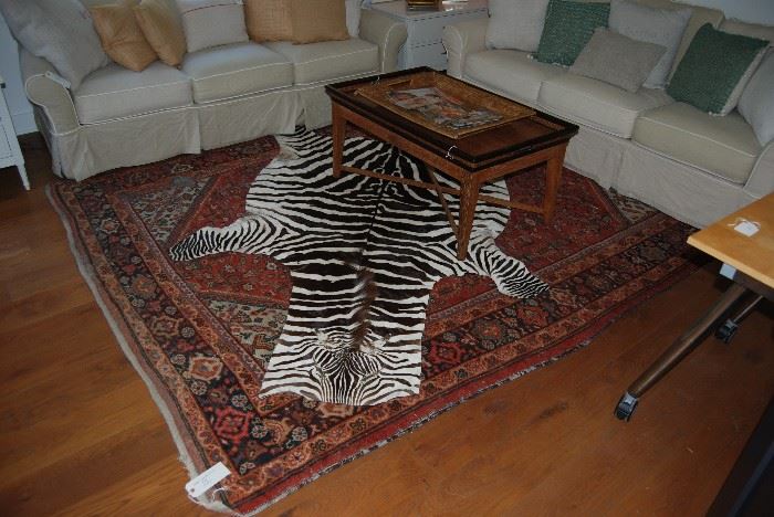 Pair of Crate & Barrel Sofas, Antique handmade rug, great coffee table and a Zebra rug