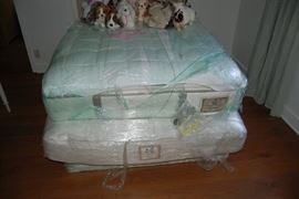 Groups of mattresses that were stored with the house was staged  and listed for sale