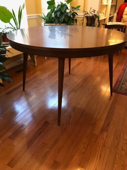 Mid-Century 48 inch round dining table with leaf/expander.