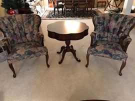 Pair of occasional chairs. Scalloped, two drawer, occasional table.