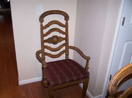 ONE OF THE DINING CHAIRS
