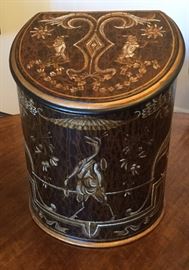 Decorative storage  bin with hinged lid and brace to keep lid open, half-moon shape, brown with extensive painted designs of animals