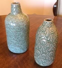2 Maitand-Smith sage porcelain vases with multiple outlined shapes in a different shade of green 