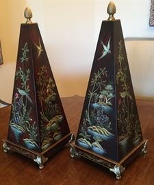 2 pyramid shaped accent pieces, dark red crackle finish with painted floral scenes with birds, set on brass base, with brass finial