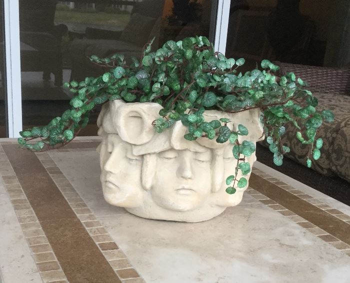 Stone perpetual face vase planter, plant included 