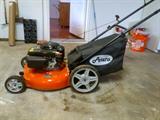 Ariens push mower with large rear wheels and a 6HP Kohler engine