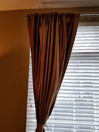Beautiful silk curtains.  Silk from India.  Black out all light.  4 panels in brown, cream and rust stripe.  Approximately 10 feet long