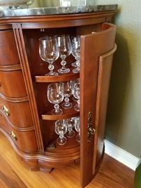 Bar cabinet.  No maker.  Rosewood with marble top.  2 side doors for storage and 4 drawers.  36" tall x 18" deep.
