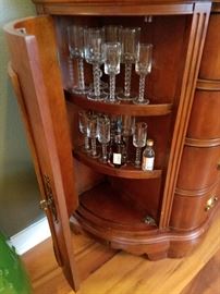 Bar cabinet.  No maker.  Rosewood with marble top.  2 side doors for storage and 4 drawers.  36" tall x 18" deep.