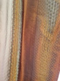 Beautiful silk curtains.  Silk from India.  Black out all light.  6 panels in gold toned circles..  Approximately 10 feet long