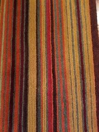 Area rug from Crate & Barrel.  Wool in earth tones.  72" x 108"