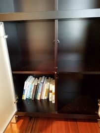 Bookcase.  Purchased at Area 51 in Cap Hill.  Solid wood with two tempered glass doors.    Adjustable shelves.  14" x 30" x 75".  