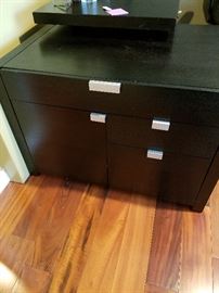 Two piece desk.    Purchased at Area 51 in Cap Hill.  Solid wood with 3 drawers and storage cabinet.    This piece is 25.5" across and 31" deep.  26" tall.  