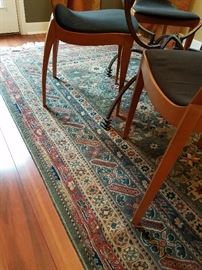 Area rug.  Made in Belgium.  Man made fiber.  5' 7" x 8' 4" in size.  