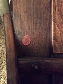 Detail of embossed wax seal from nineteenth century seeder.