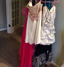 Special occasion dress selection in cocktail styles and one sequin and bead accented floor length frock.