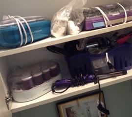 Hair care items such as hot rollers, styling wands and an ion curling iron. Conair, Profiles, Helen of Troy. Revlon and Ion wands. Cutler clips.