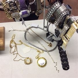 Watch selections in silver, gold and leather band types. Clock pendants. Timed, Bulova and other brands available. 