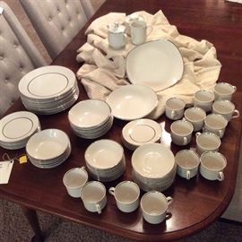  Made in England, this Salem set from International Ironstone has a white ground and shiny silver accent stripe. Vintage set comes with serving pieces.