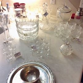 Oneida Silversmiths dip tray, punchbowl, ladle and cups. Etched glass wine decanter with matching goblets. Ice bucket with tongs. Nesting salad bowls. Pair of champagne flutes.