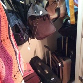 Luggage including rolling captain’s cases. Duffel bags, totes. Garment bag for travel.