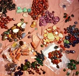 Polished stones for jewelry making, inlay work and other do it yourself craft projects. Variety of natural colors in shapes such as cabochon, sphere, teardrop, pyramid, circle, oval and many more. Colors are tans, brown, rust, purple, cinnabar, shades of green, peach, red hues and sea foam greens.
