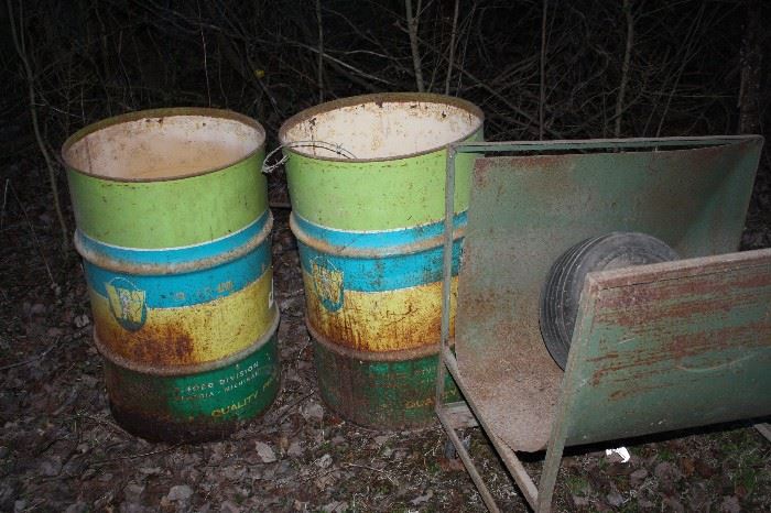 couple of old Waste Management Barrels