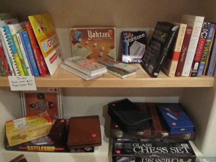 Books, game boards including complete battleship game.