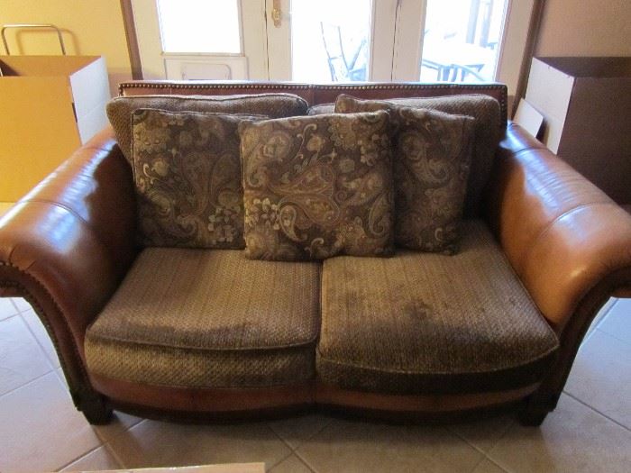 Brown leather and fabric sofa set.