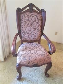 1 of 2 Arm Chairs. Please note that there are carved winged sides on all chair backs. Elegant Upholstery in neutral colors