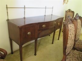 Unique Vintage Sideboard with Brass Gallery by "Old Colony". Traditional style in rich darker wood with fine details. Size: 72" X 24" X 37" + 13" high for the gallery.