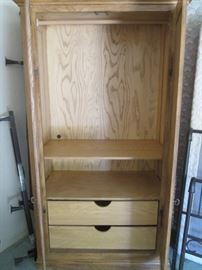 Interior View; Clothing Pole, Shelf and Drawer Storage