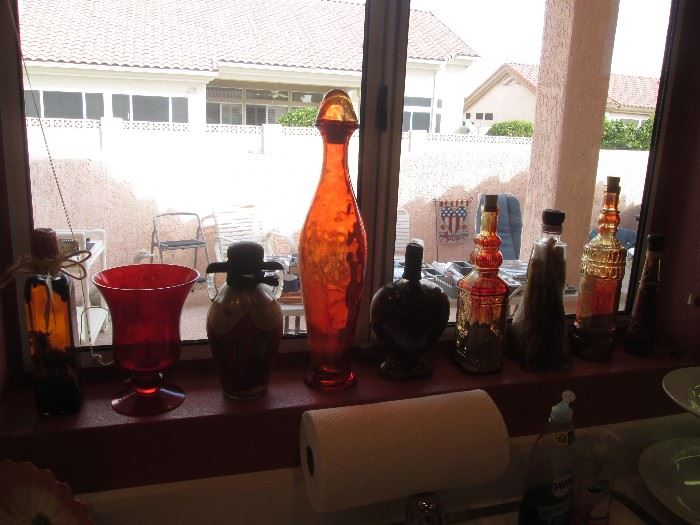 Many Jars, Vases, Bottles and Colored Glass