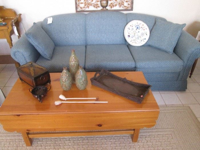 Traditional Coffee Table with Drop-sides, knotty pine.     Queen Sleeper Sofa by La-Z-Boy.        