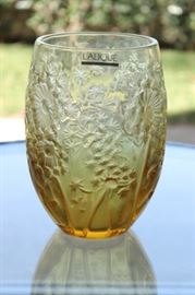 5)  Lalique Bucolique Amber Vase, - Bucolique, of ovoid form decorated with dandelions, signed Lalique R France. 
Size: 7 inches High x 4 3/8 Inches Wide
Asking Price: $950