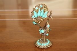 43) Antique Metal Peacock w/ Stone Accents
Size: 4.5 Inches High x 3.25 Inches Wide
Asking Price: $295