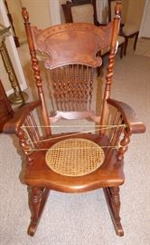 Unique, Antique walnut barley twist rocking chair with caned seat