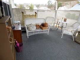 Wicker outdoor set, twin brass bed with rails in rear