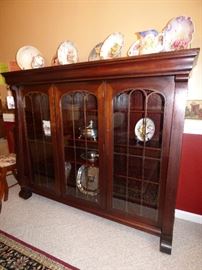 Antique mahogany glass front bookcase