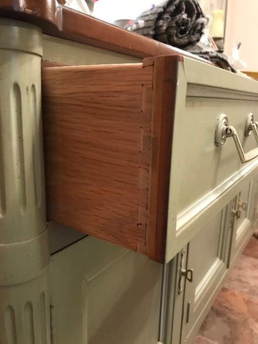 Close up of drawer on buffet.
