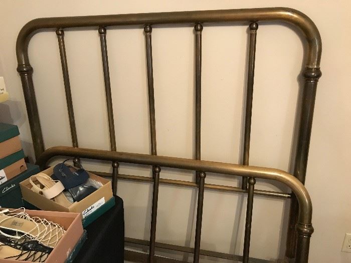 Heavy antique brass bed and includes bed rails and mattress slats.  Frame would be double size since it is antique.  Did you know that Queen and King size beds weren't made until the 1950's?