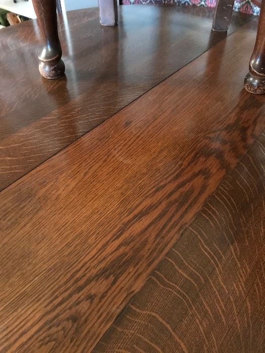 Close up of top of oak table.