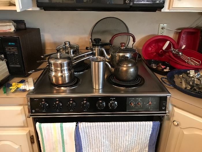 Lots of various cooking pans and accessories.