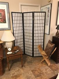 There are 2 room dividers.  One is black and one is natural oak.