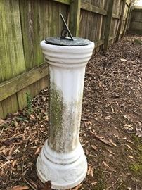 Sundial on pedestal.